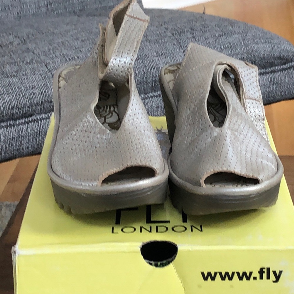 New , silver, perforated suede Fly London Yala